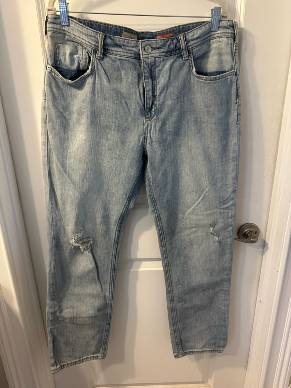 Anthropologie’s Pilcro Light Blue Boyfriend Jeans with Knee Rips